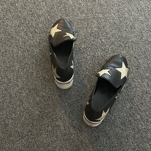Stella McCartney Black and Gold Star Moccasins